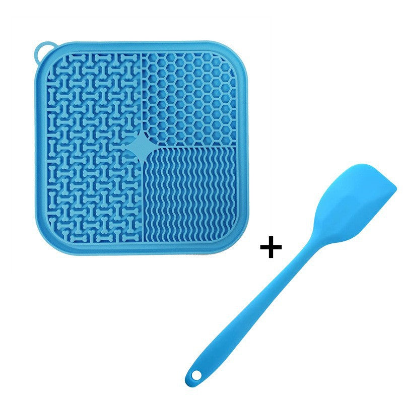 LickCalm lick mat in use — pet enjoying treats spread on textured silicone surface